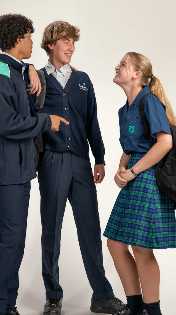 Three Waterford College students talking together