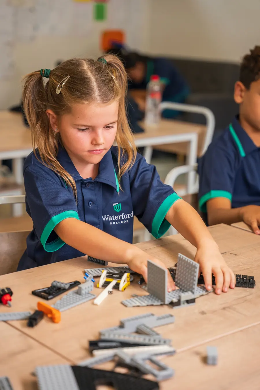 A child building with construction blocks